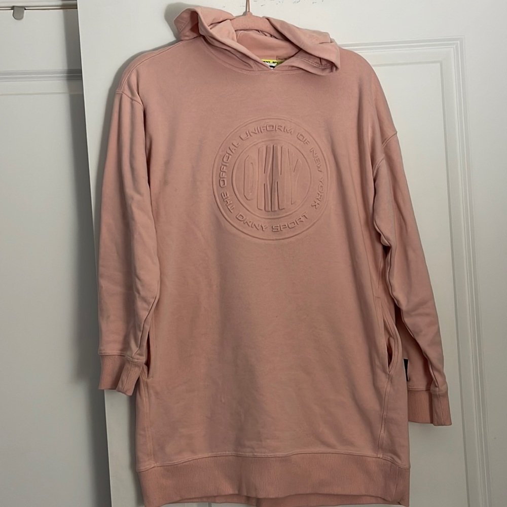 DKNY pink sweatshirt right past the waist